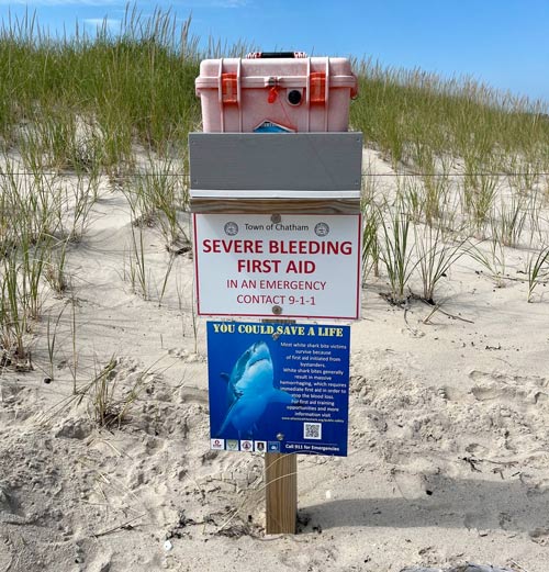 The severe bleeding first aid kits are a stark reminder of the threats posed by Great White Sharks at Nauset Beach.