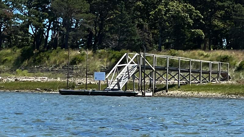 There's a small dock on Sipson Island located in shallow water on the northwest side of the island, just beyond the channel on your route.
